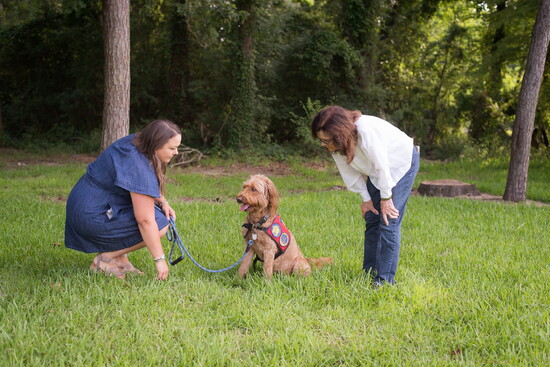 Owner Kristen Johnson with George and Bobbye
