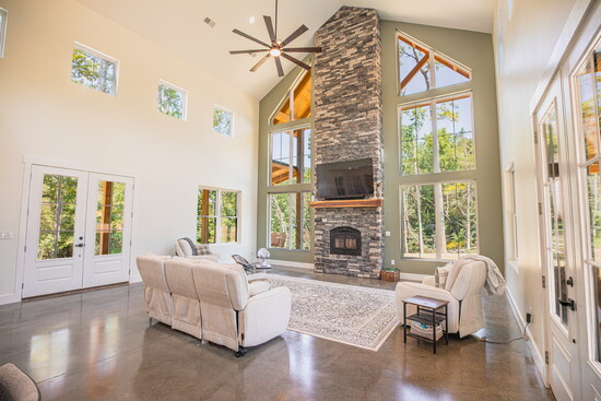 The interior of the home features soaring ceilings.