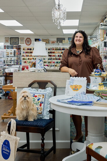 Sarah Adam, owner of Stitchers, and Winnie (seated)