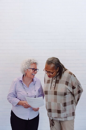 Love Columbia coaching staff member Ronnie Kitchen with volunteer Kitty Spencer
