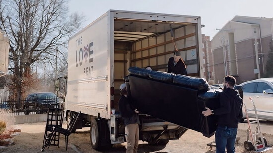 The Love Seat team helping with a move