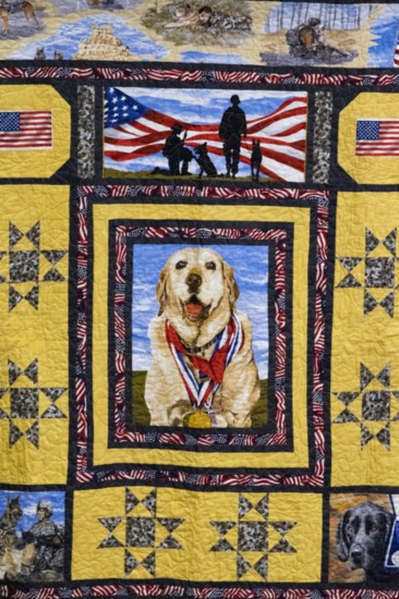 Every veteran receives a handmade Quilt of Valor at the Passing of the Leash ceremony. 