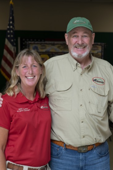 Canine Program Manager Heather Wilkerson and Chairman Mike Kitchens