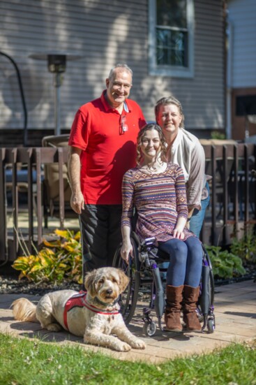 Maddie with her family, photo by Matthew J. Capps 