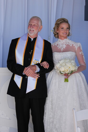 Pastor and friend, Larry Swank, escorted Julia down the aisle...