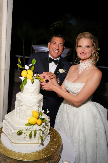Their wedding cake was a one-of-a-kind honey layer creation adorned with intricate Italian lemon-inspired artistry.