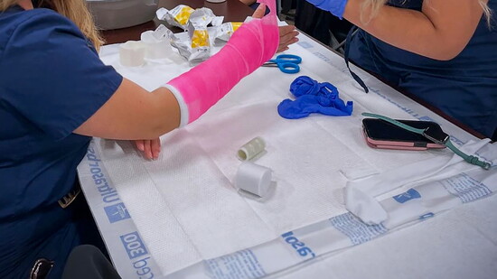 A Lone Star provider demonstrates compassionate care during a hands-on community health event.