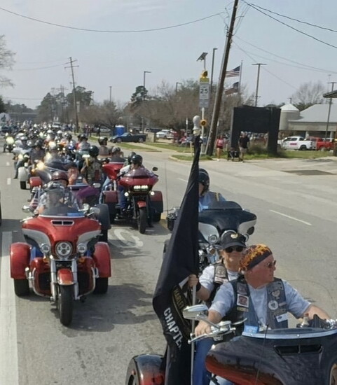 2026 Go Texans Parade riders trail back as far as the eye can see. A long tradition since the first Go Texans parade. 