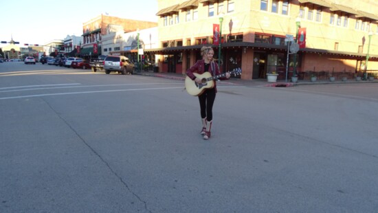 Standing in front of The Corner Pub in downtown Conroe on Main Street. 