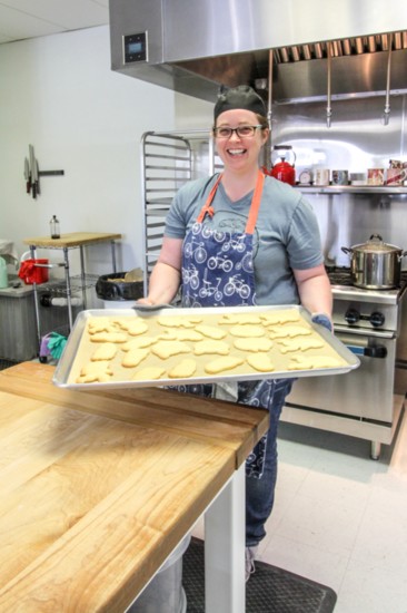 Hope Alexander prepares the specially shaped cookies for the oven.