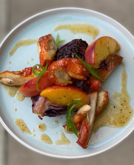 Harissa chicken with Sautéed Peaches & Braised Cabbage prepared by Chef Stacia Epps. Photo courtesy of Stacia Epps.
