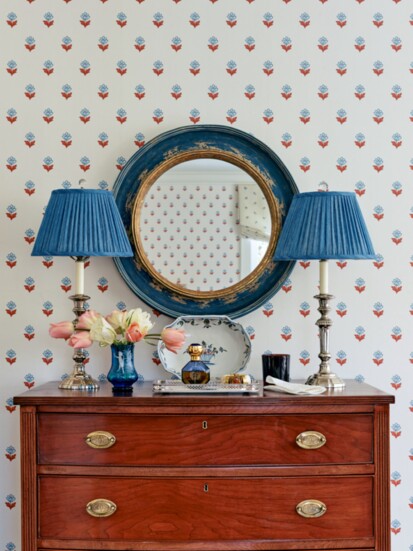 An antique chest that once belonged to the homeowner’s uncle, a revered Charlotte interior designer, offers storage and stature in the bedroom. The round 