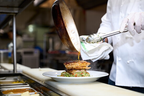 Chef Mario Valasquez at the stove in Cotton Hollow Kitchen