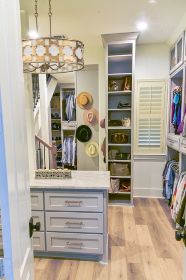 A two-story closet offers sprawling storage space. 