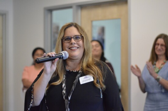 Dr. Lisa Greenwald making remarks at the Redmond clinic grand opening.