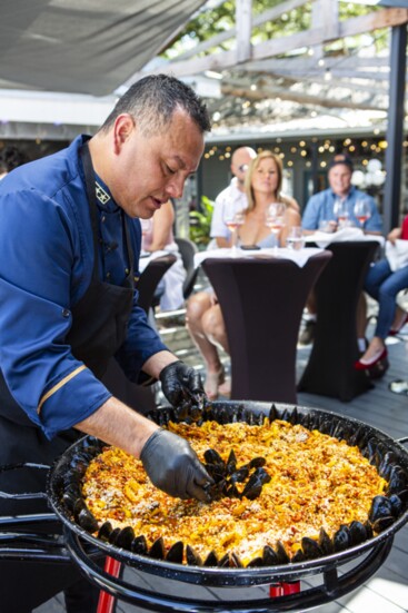 Thomas Perez creates the perfect paella for a class on the deck of Plane and Level.