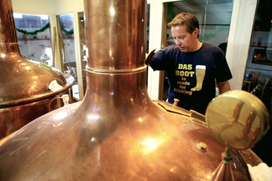 Royal Bavaria Restaurant, Brewery and Beergarten proprietor Andy Gmeiner oversees a batch of craft beer.