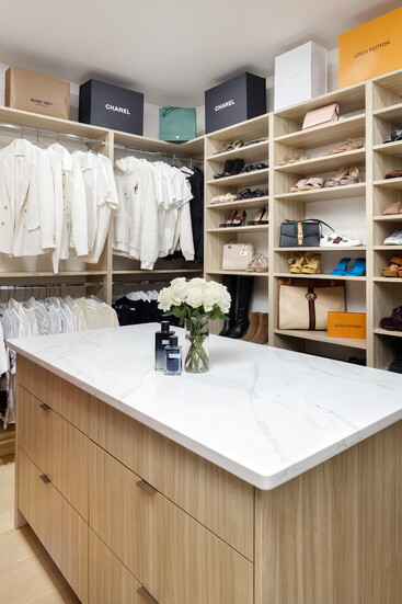 A dressing table is a key design feature in any luxury closets.