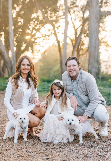 Lisa with her husband, Levi, daughter, Livia, and dogs, Lexi and Luna.
