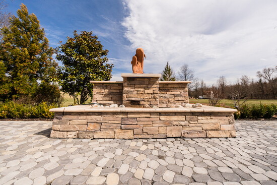 Integrated water features serve as a dynamic addition, bringing movement and visual interest to modern landscape designs.