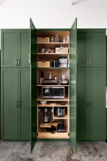 To reduce clutter and aid in function, this cabinet features movable sections and outlets so appliances can be used easily and efficiently. 