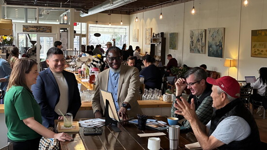 Chamblee City Manager (pictured on the right) speaks with Chamblee residents at a recent Coffee with the City Manager event in Chamblee.