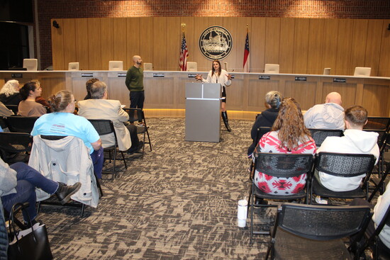 Chamblee City Manager Kristen Gorham addresses a crowd at Chamblee City Hall. 