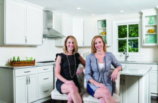 Lori and Julie of J&L Interiors in their gleaming new kitchen
