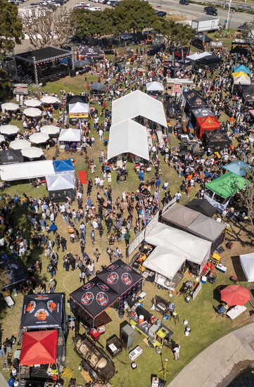 A bird’s-eye view captures the crowds and vendors at the Long Beach BBQ Festival.