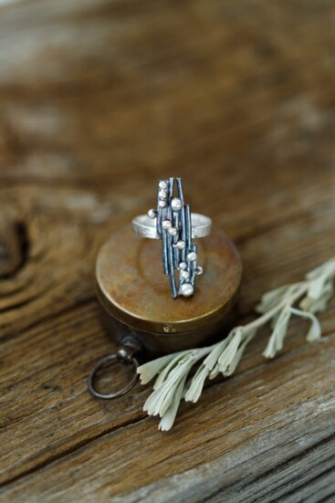 Lovejoy created this ring using 22 gauge silver wire and sterling silver beadwork with a heavy patina to show depth and texture. 