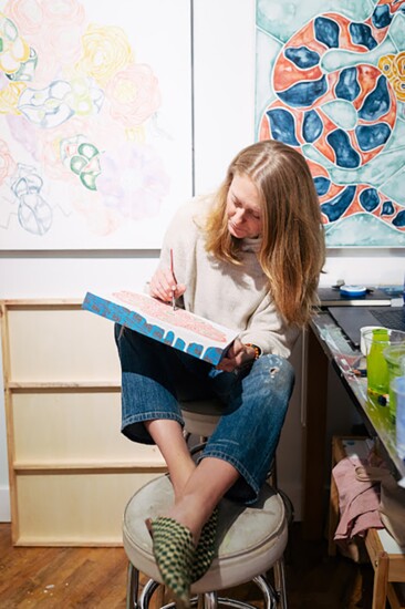 Ashley Nell paints in her studio located within Arrow.