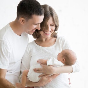 new-parents-holding-newborn-baby-mom-dad-father-mother-300?v=2