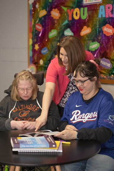 Two Harford Center participants with Laura Weinstein (pictured center). Photo Credit: Kerry Paradis Photography