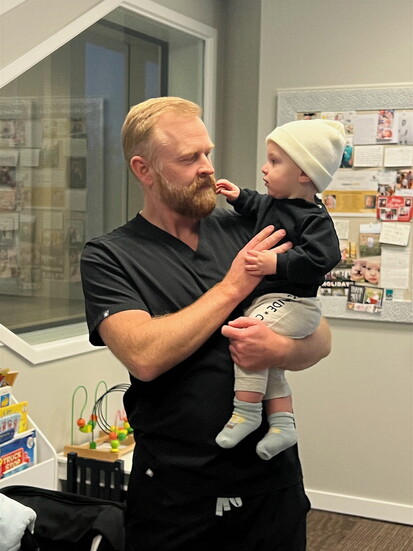 Dr. Devan Griner with a Utah Smiles patient
