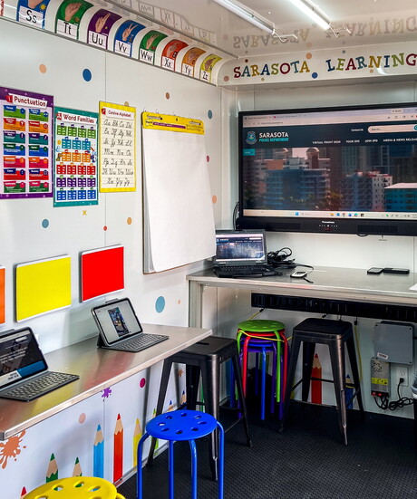 Inside the Sarasota Learning Center students enter a fully equipped space with iPads, books and hands-on learning tools.