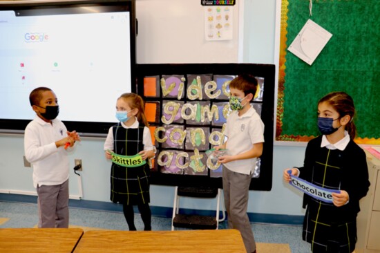 First graders present their candy store launch strategy