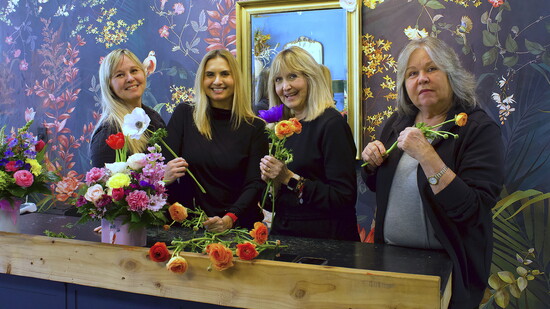 Owner Marcela Viana and her family