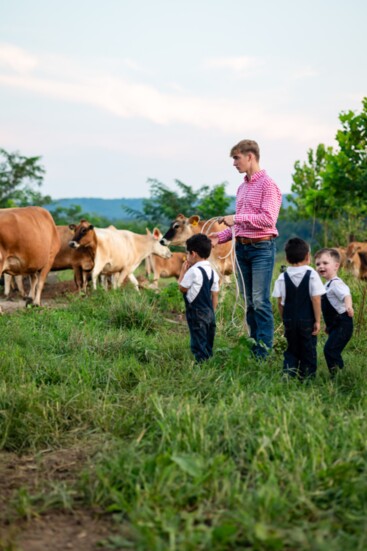 Josh Vineyard teaches his young nephews how to use a lasso