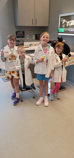 Emersyon, Kooper, Emma, and Rilee at the Mock Vet Clinic