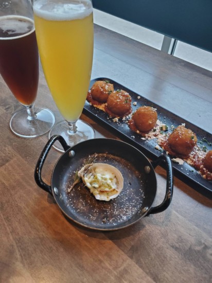 Oyster and Mac and Cheese Balls and beer. (PHOTOGRAPHY KAYLEE CAMPBELL)