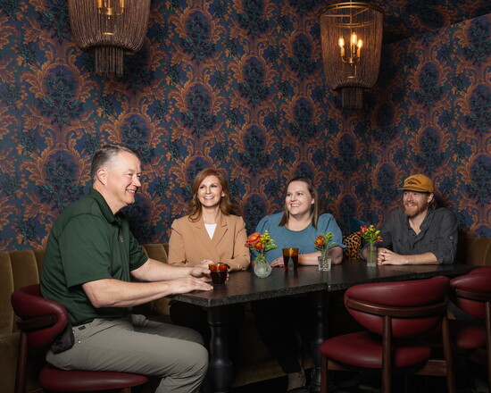 John Riley and T'aira Ugarkovich from Cullman Savings Bank with Katie and Jacob Fine of Jubilee Coffee and Wine Bar