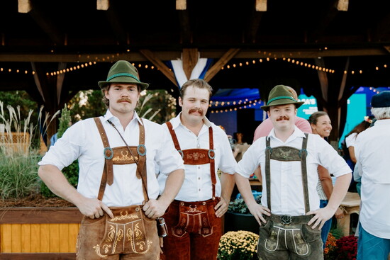 Ryan Lambert, Zach Holmes and James Kelsey pose at Cullman Oktoberfest in 2025.