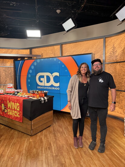 Brian Seifried and Samantha Corliss at Great Day Colorado morning show talking about National Chicken Wing Day