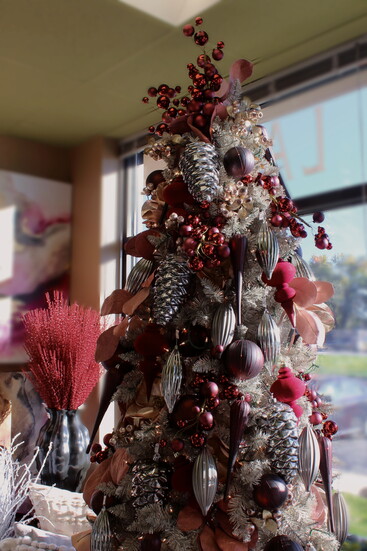 Pink details are mixed with burgundy, silver and mauve to bring rosy dreams to life while maintaining a neutral aesthetic.