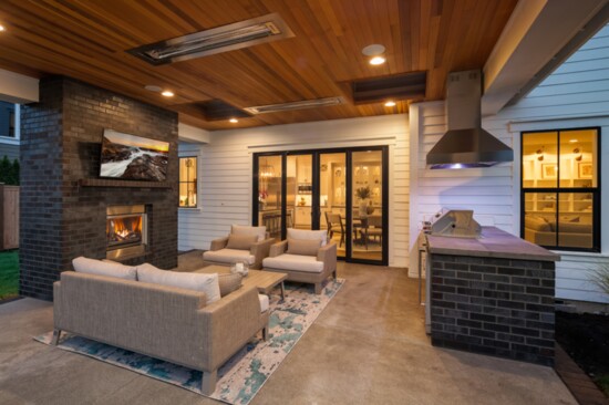 High ceilings supported by exposed beams are featured both inside and outside.