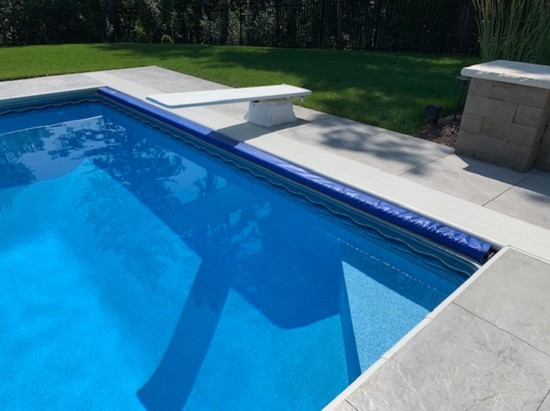 A swim out shelf is easier to use than a ladder and creates a cleaner look for your backyard.