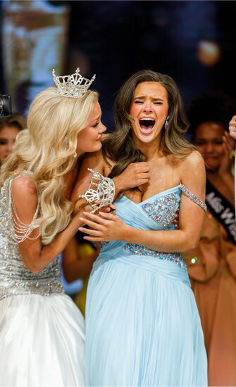 Miss America's Teen, Peyton Bolling, being crowned while wearing her custom gown sketched by Stephanie Oelschlaeger and created by Sherri Hill. 