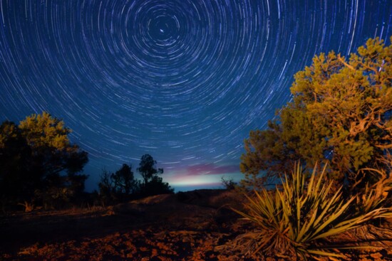 Teraji captures night's vinyl album turning above Uravan, Colorado.