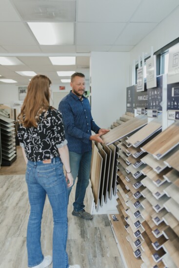 Jeff Ullum guiding a customer through his showroom