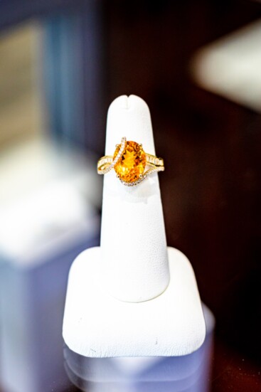 Ring with 14K oval Yellow Citrine in crossever diamonds